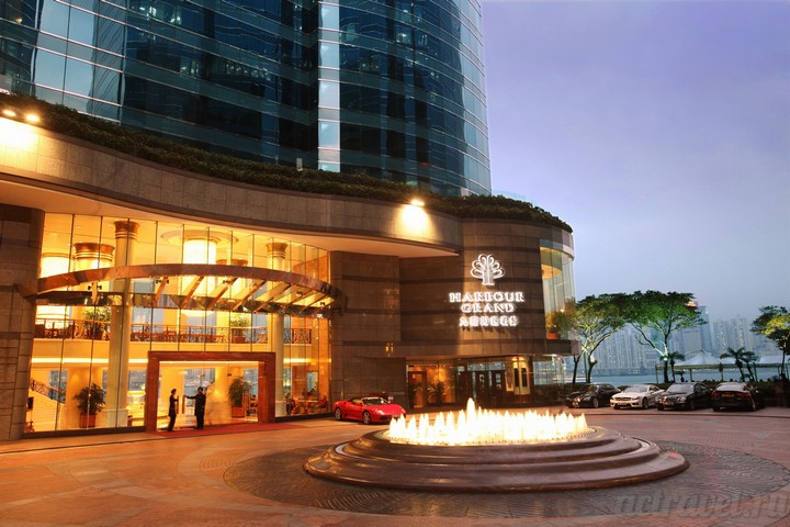 Вечер. Внешний вид. Отель Harbour Grand Kowloon, Гонконг