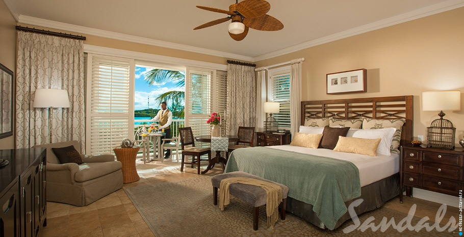 Номер Beachfront Butler Junior Villa Suite в отеле Sandals Emerald Bay